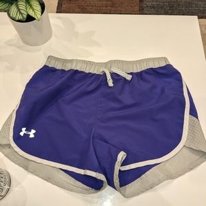 Under Armour running shorts in purple